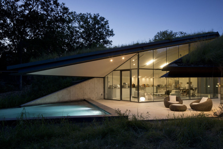 house-built-into-hill-moonlit-pool